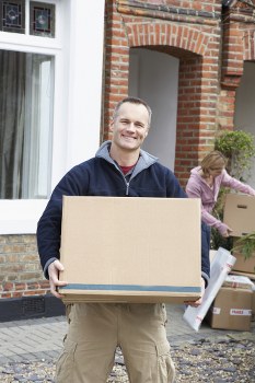 Man and van team preparing items safely for transport