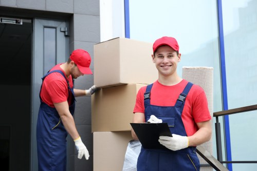 Student removals team helping with boxes and furniture in Hithergreen