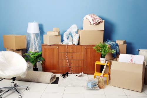 Removals team loading furniture for a home relocation in Hithergreen