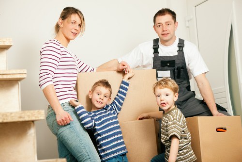 Packed moving boxes and furniture prepared for transport