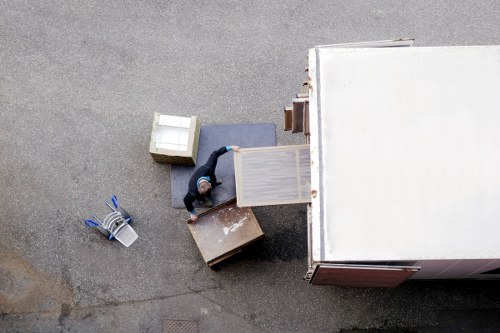 Professional movers reviewing safety checks before loading