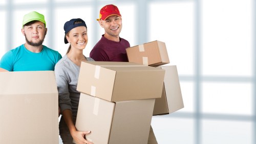 Packed boxes and furniture prepared for local storage