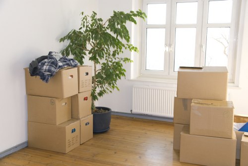 Furniture being loaded into a van for transport in Hither Green