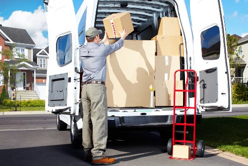 Household furniture being loaded into a removal van