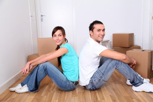 Office relocation team preparing desks and boxes for a Hithergreen business move