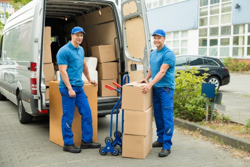 Careful removal of bulky household furniture from a local property