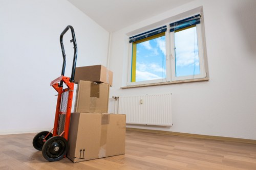 A local office relocation service unloading equipment at a new workspace