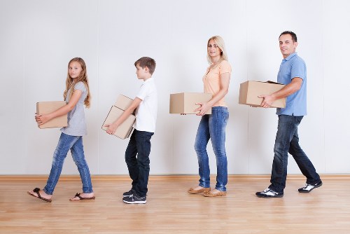 Checklist and packed boxes ready for a home move in Hithergreen