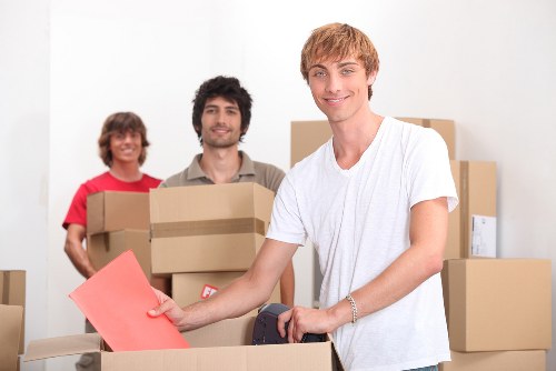 Boxes and furniture being loaded for a local apartment relocation