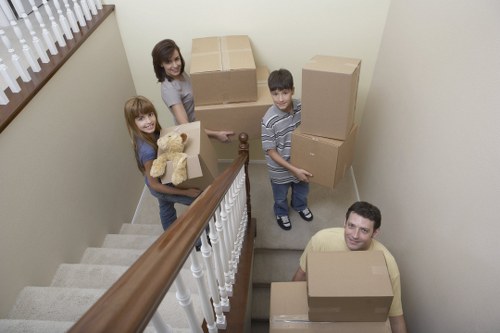 Specialist piano movers working in a Hithergreen home
